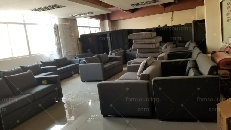 Apartment project sofa workmanship check during furniture quality control