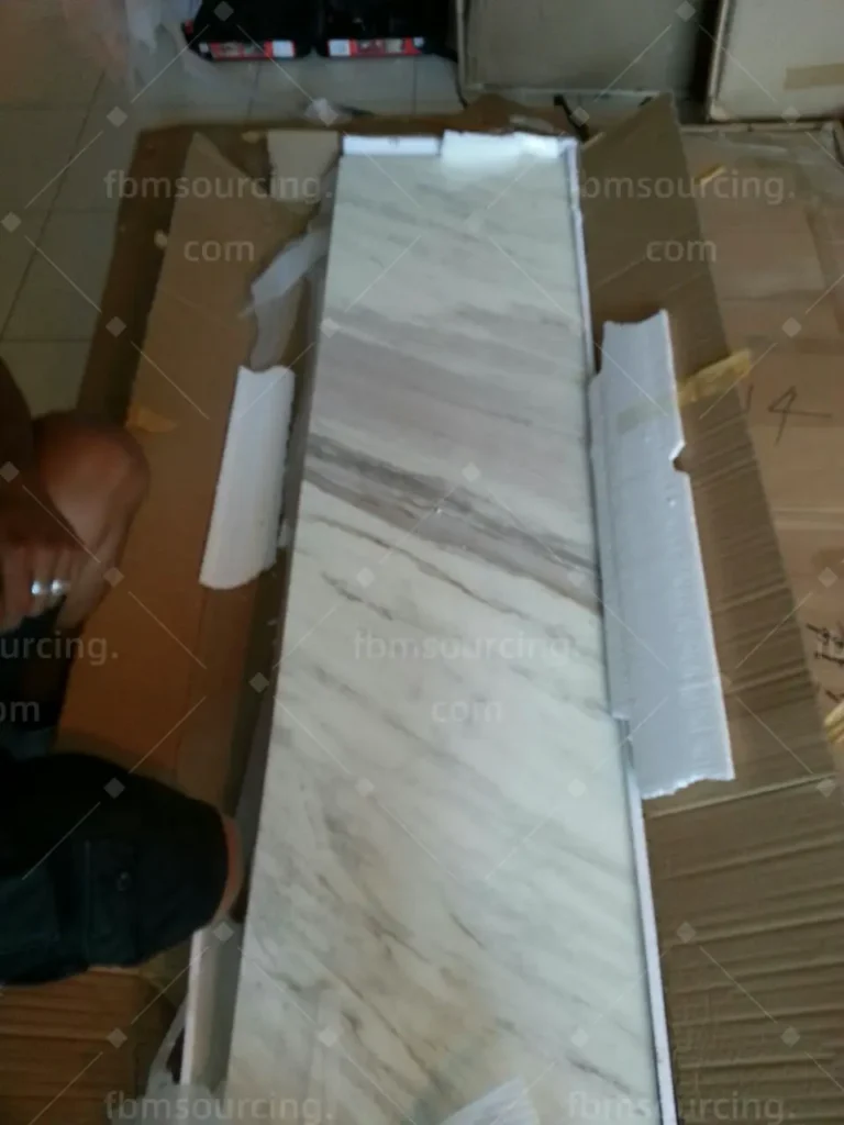 White marble stone slabs at Guangzhou stone market — FBM Sourcing Dubai apartment procurement