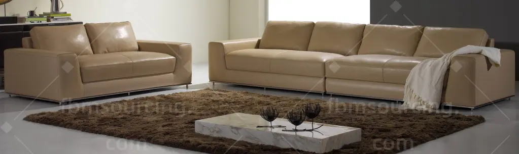 Tan leather sofa set with marble coffee table sourced from Guangzhou furniture market for Dubai apartment — FBM Sourcing