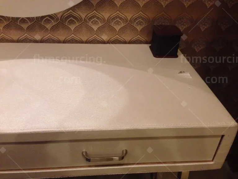 Beige upholstered furniture cushion texture inspection — FBM Sourcing Dubai
