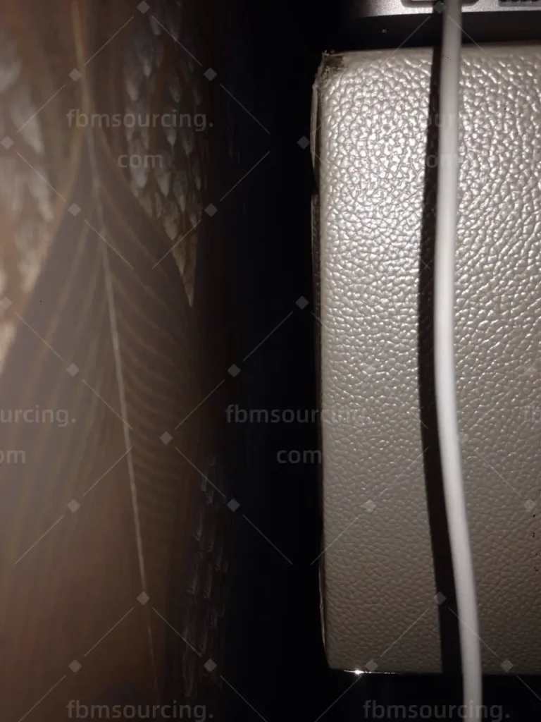 Brown leather texture close-up during quality inspection — FBM Sourcing Dubai
