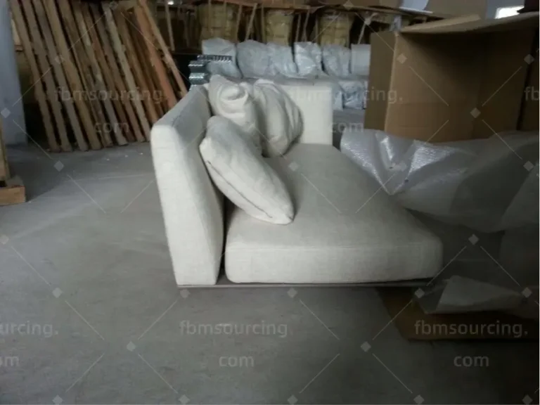 Sofa set being loaded and secured in container for Dubai shipment — FBM Sourcing