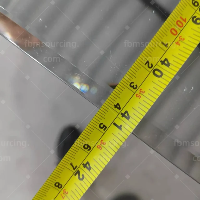 School mirror thickness and edge check with tape measure — Florida elementary school QC