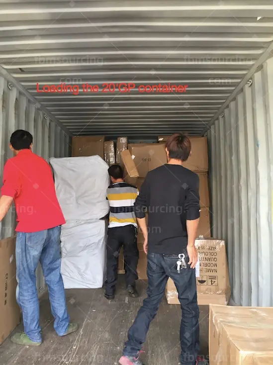 furniture sourcing agent container loading - container half loaded with crated furniture - Iran restaurant furniture procurement