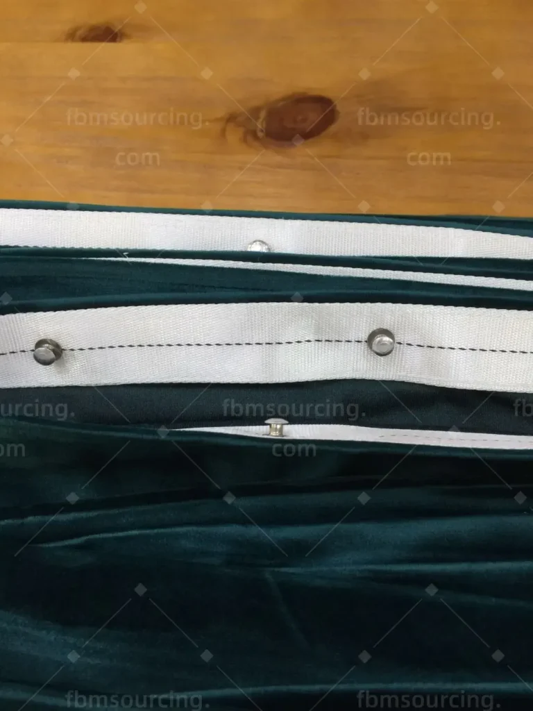 Teal velvet curtain heading and hook detail quality check