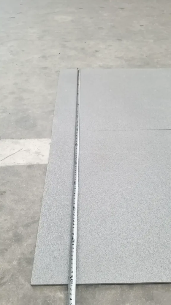 Grey porcelain outdoor tile thickness measured during China QC