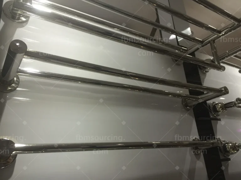 Stainless steel towel racks compared in a Foshan sanitary ware showroom for the villa bathrooms
