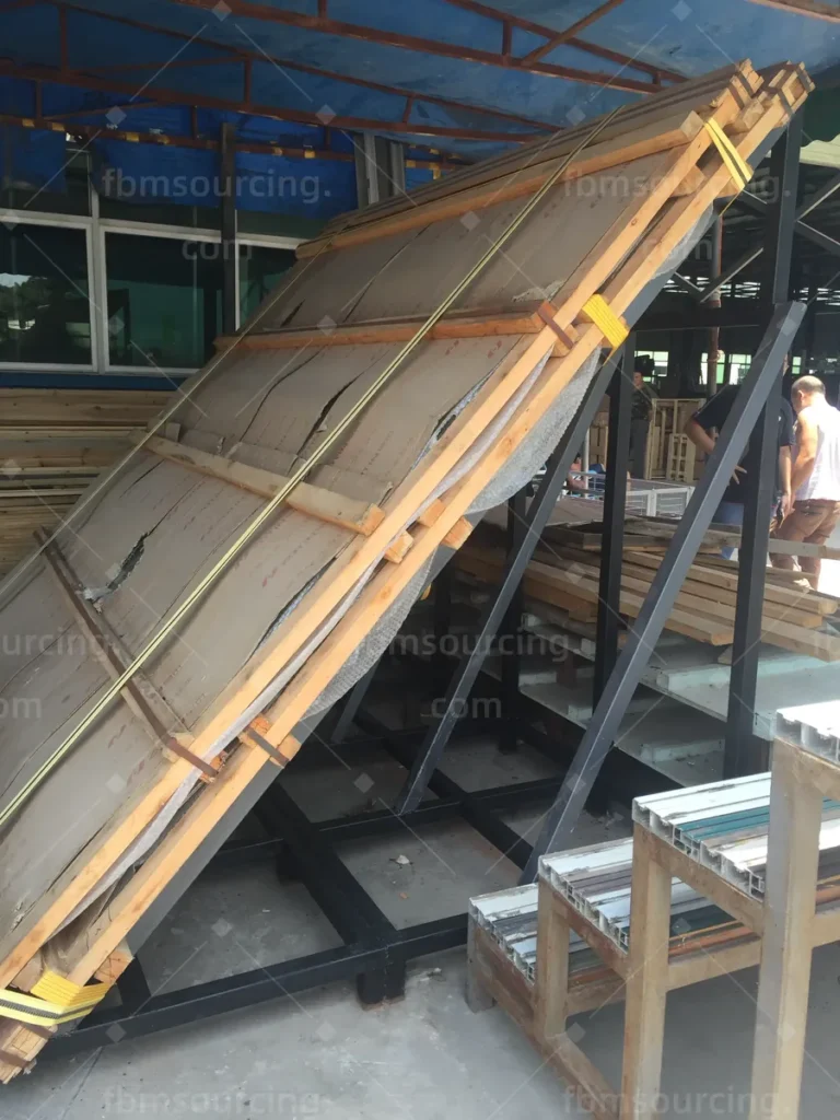 Packed window units strapped to a steel A-frame ready for container loading