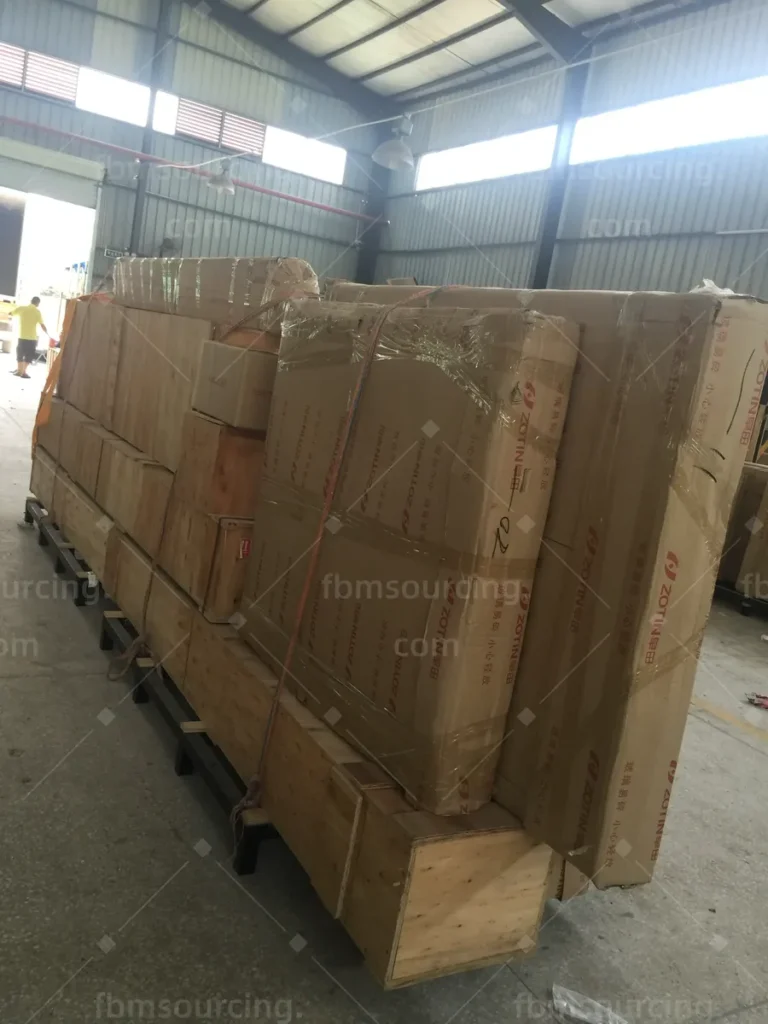 Protective-wrapped bundles of window frames stacked on pallets for export