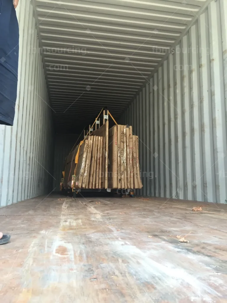 Empty 40HQ container checked before loading furniture from China - hotel FF&E container planning