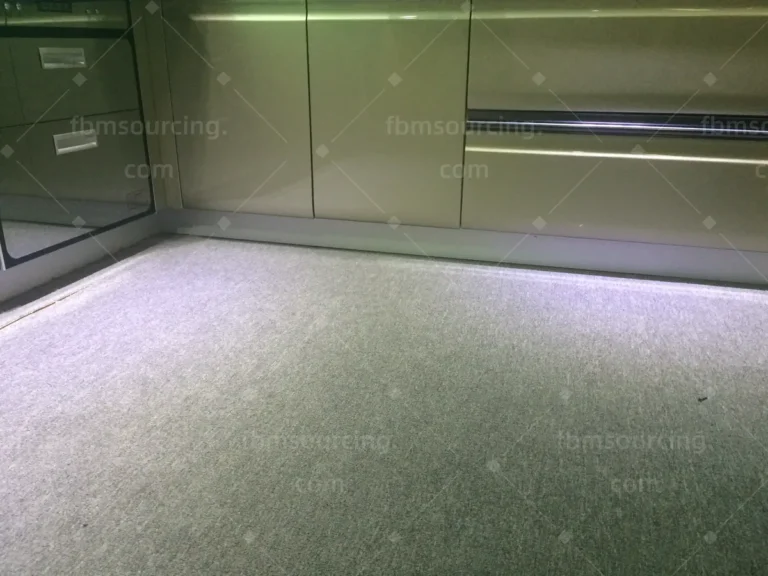 Kitchen cabinet and benchtop combination reviewed in a Foshan showroom for an Australian villa fit-out