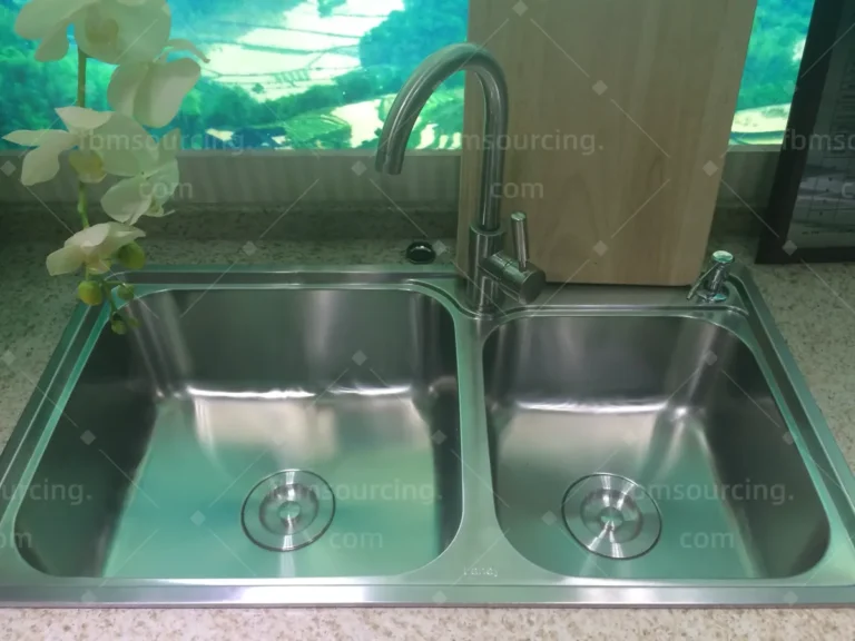 Stainless steel double-bowl kitchen sink and mixer tap shortlisted during villa sourcing in China
