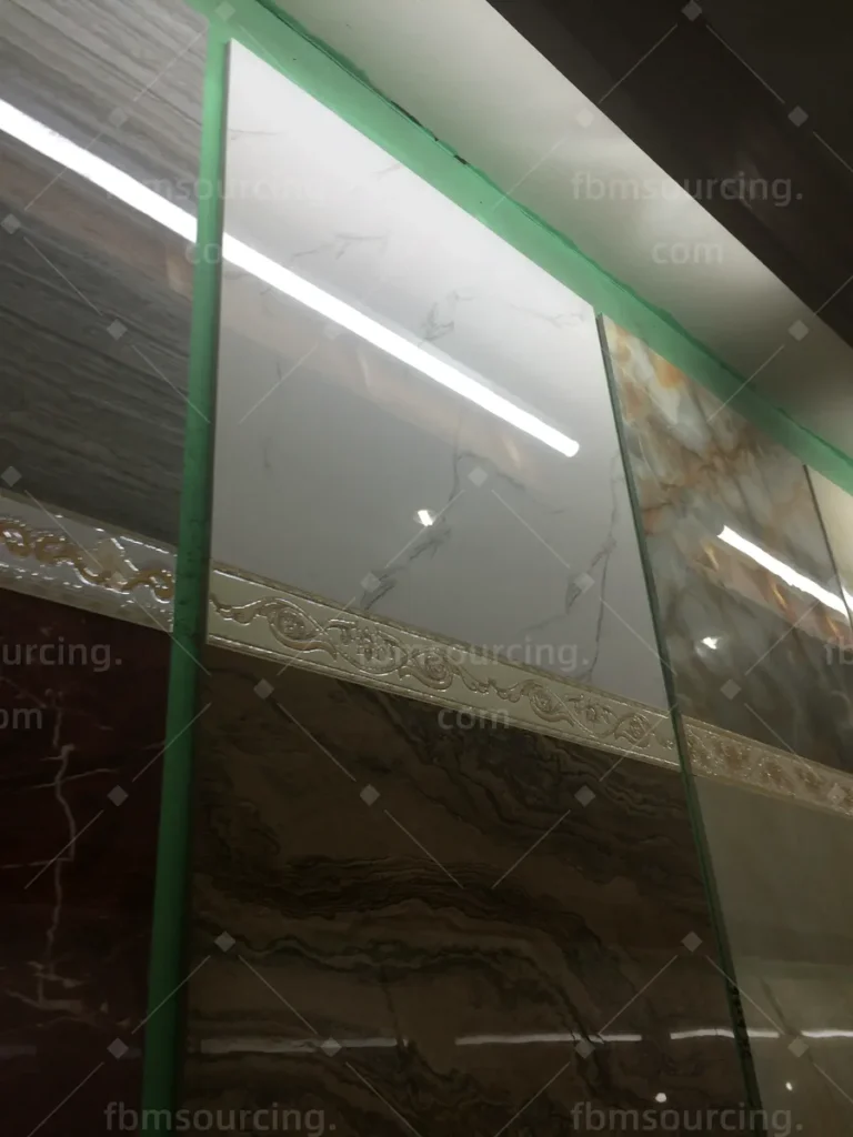 Polished porcelain slab options compared in a Foshan tile market for the villa floors