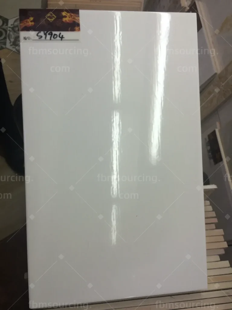 Glossy white porcelain wall tile sample selected for the villa bathrooms