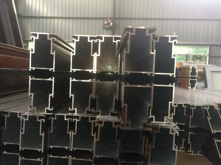 Extruded aluminium profile sections checked for wall thickness and finish