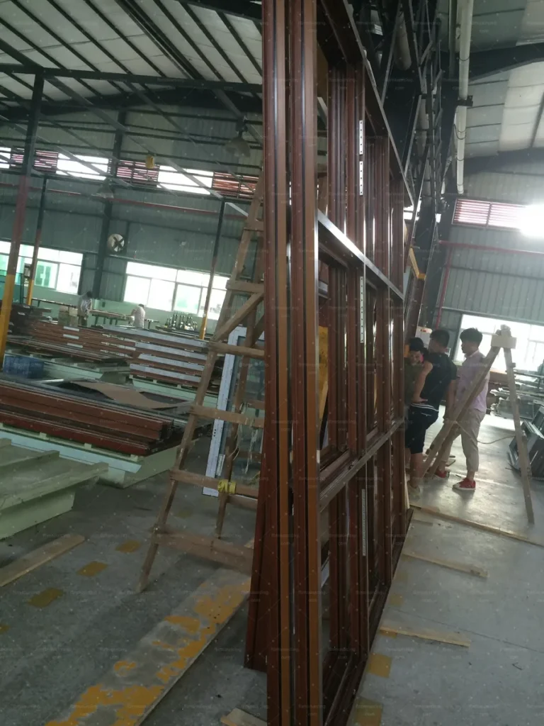 Full-height door frame checked for straightness in the factory workshop