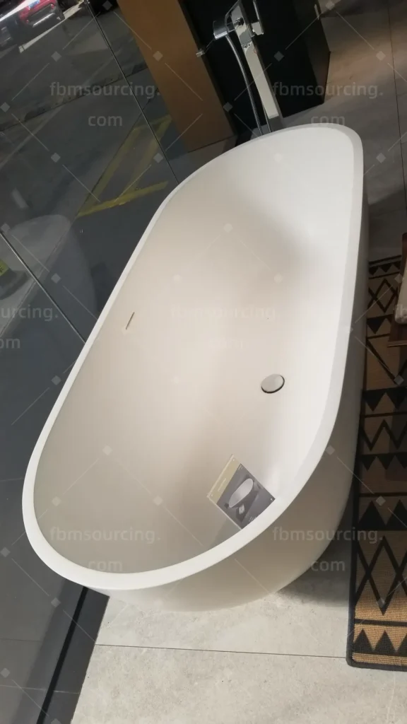 Freestanding stone bathtub selected with client in Foshan showroom