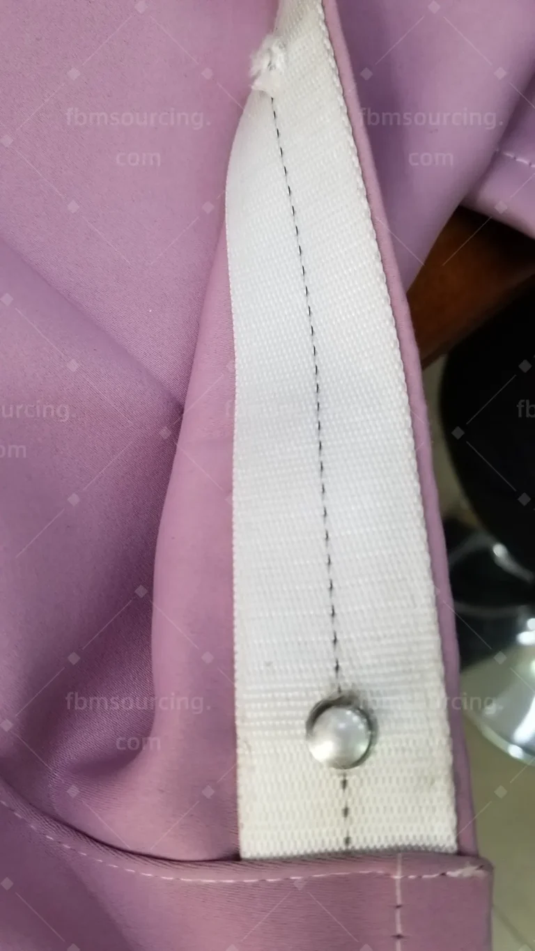 Curtain heading tape and stitching detail checked with supplier