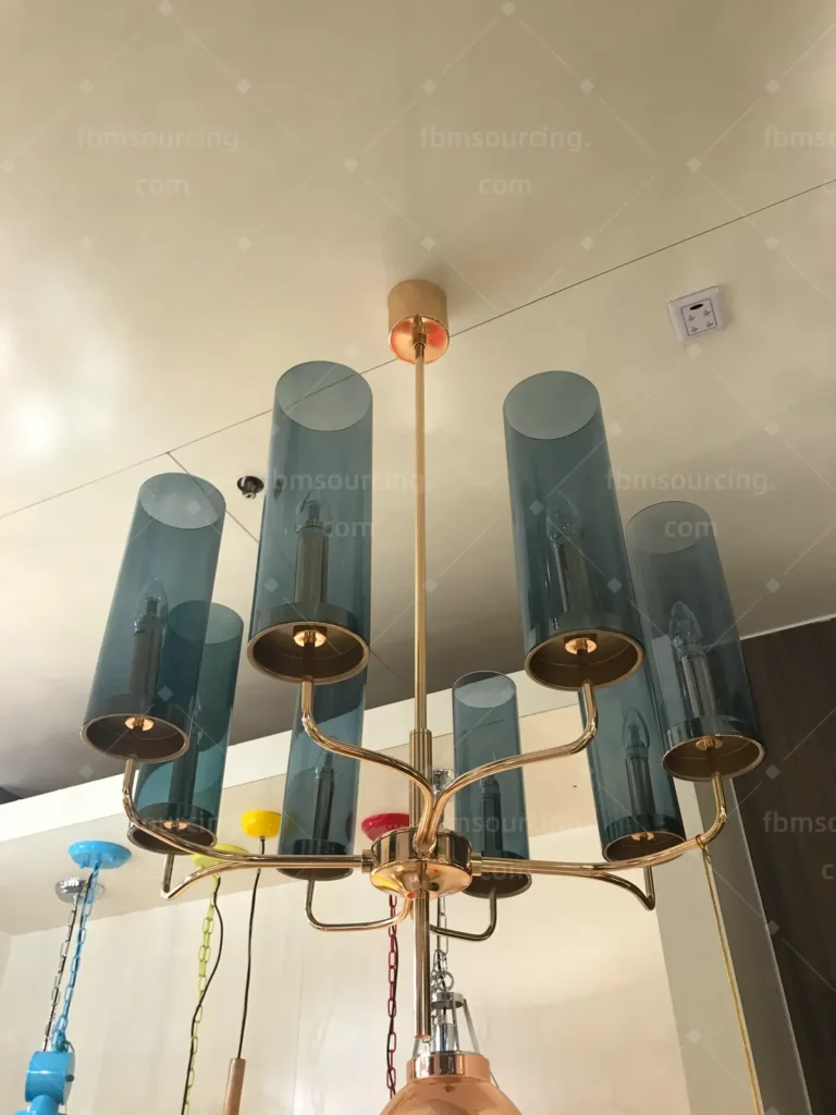 Blue glass and brass candle chandelier selected at lighting market