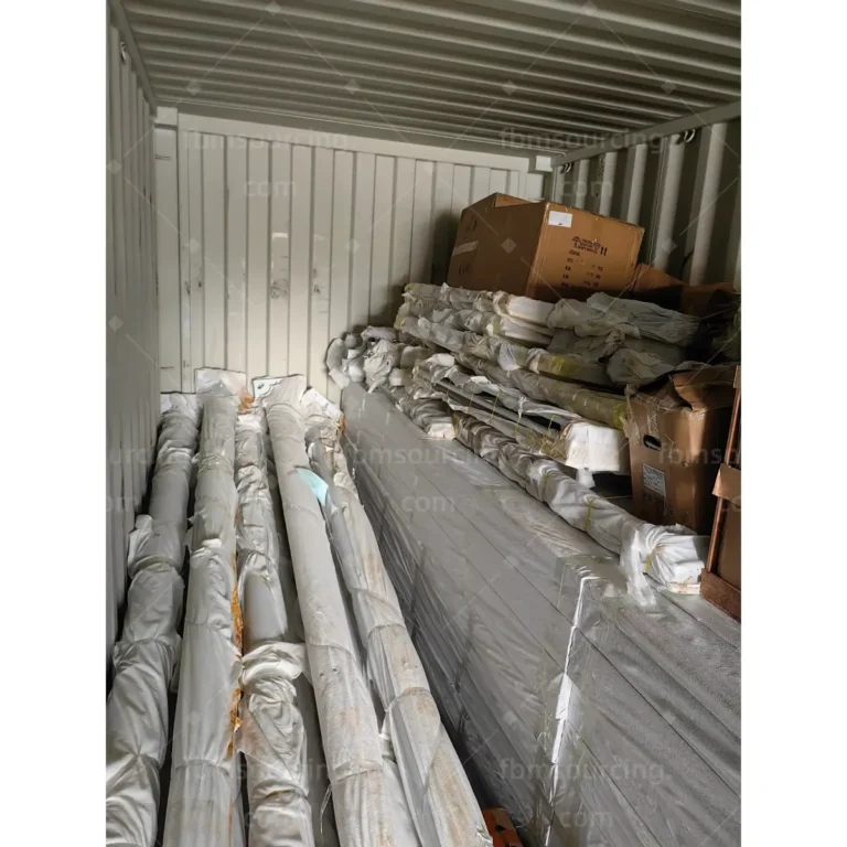 Wrapped street light poles loaded with protective separation inside container