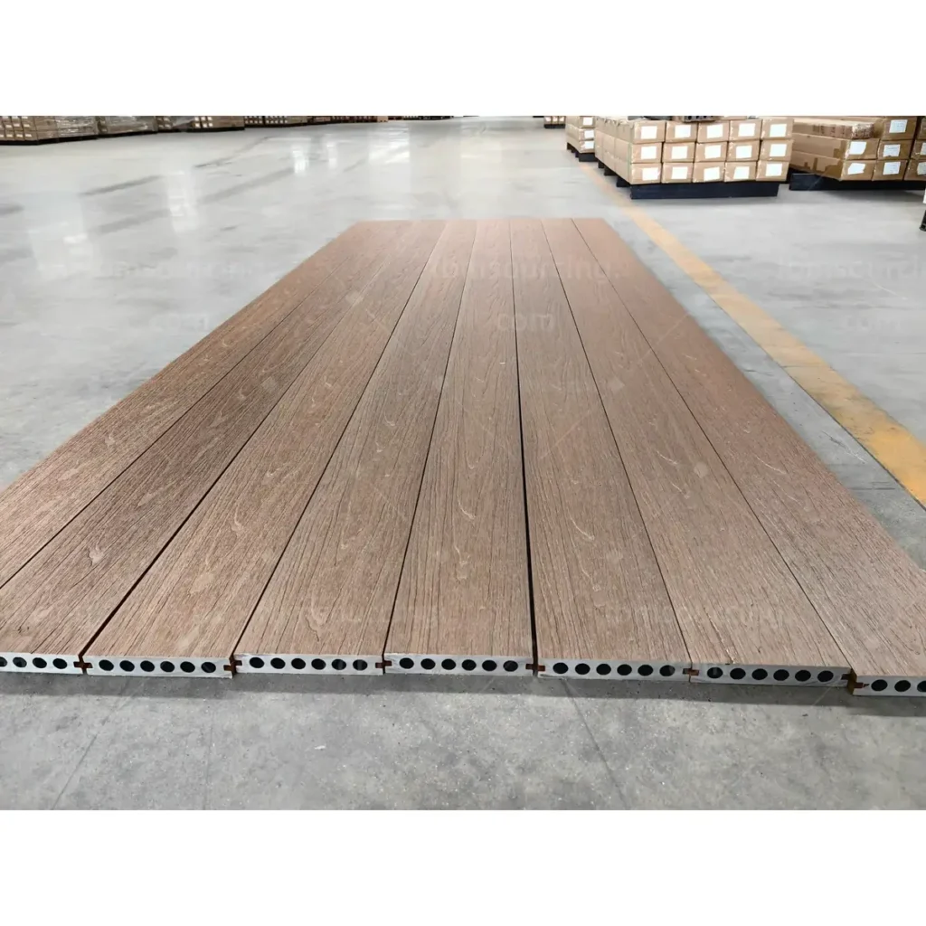 WPC decking boards laid out for quality inspection at China factory — municipal park procurement