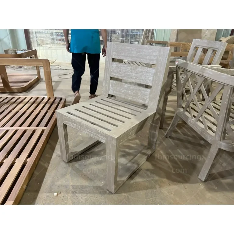 Outdoor teak lounge chairs during production inspection for municipal park FF&E order