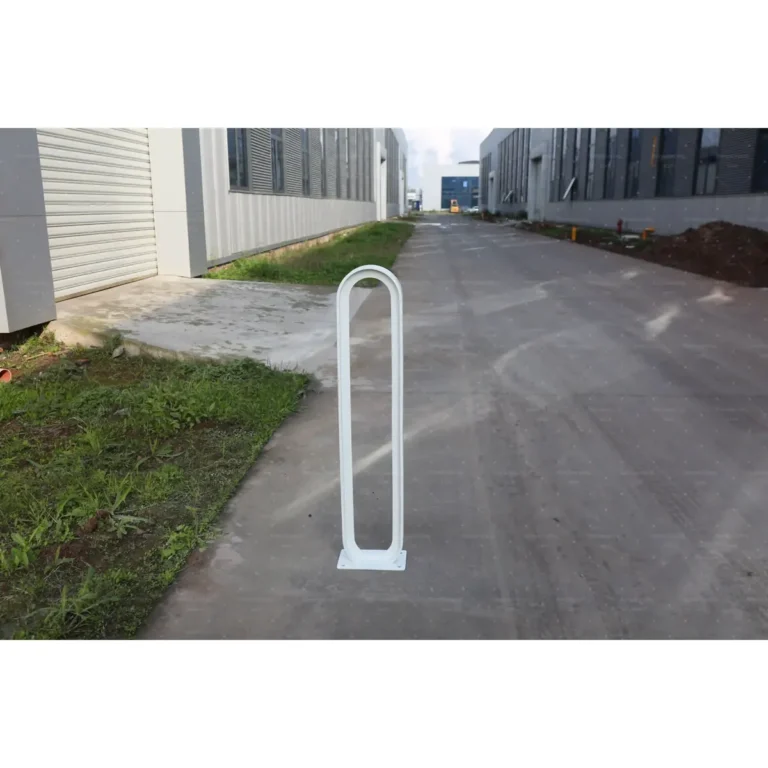 Powder-coated bike rack sample installed for stability test — park site amenity QC