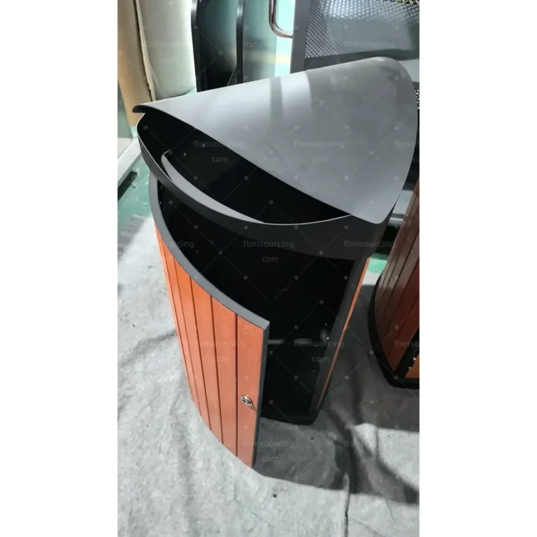 Steel and wood park litter bin lid mechanism checked during factory inspection