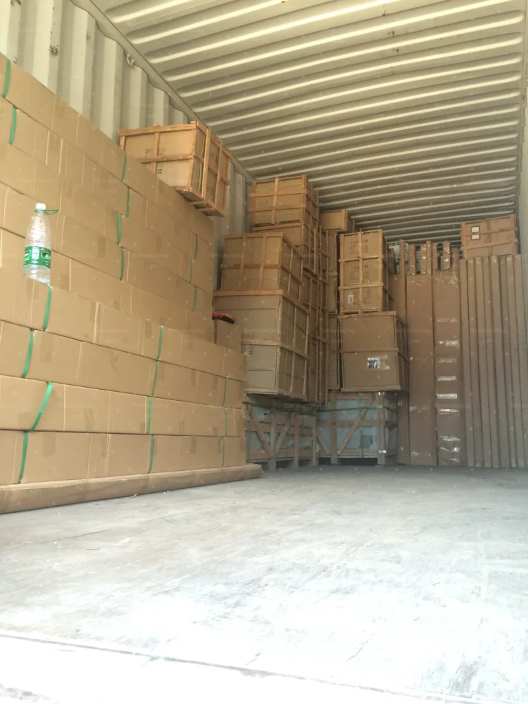 Cartons and crates consolidated inside the container for the villa shipment