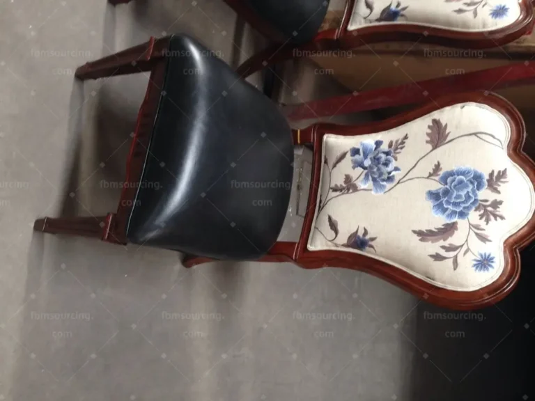 Dining chairs lined up for final inspection at a China furniture factory