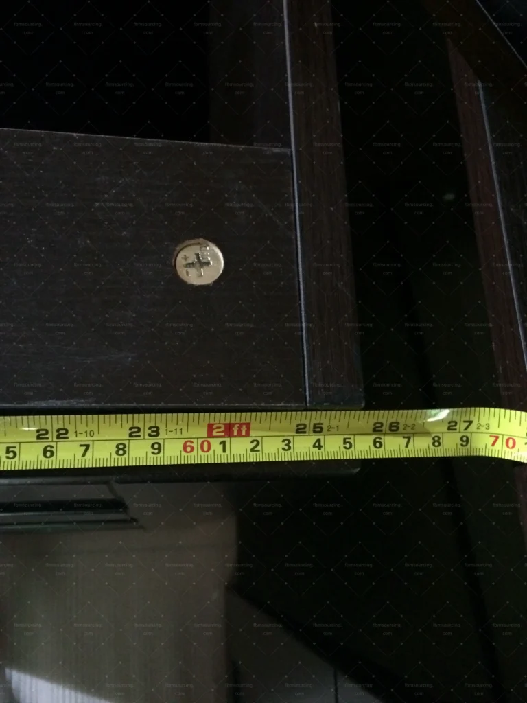 Measuring cabinet panel dimensions during casegoods quality inspection
