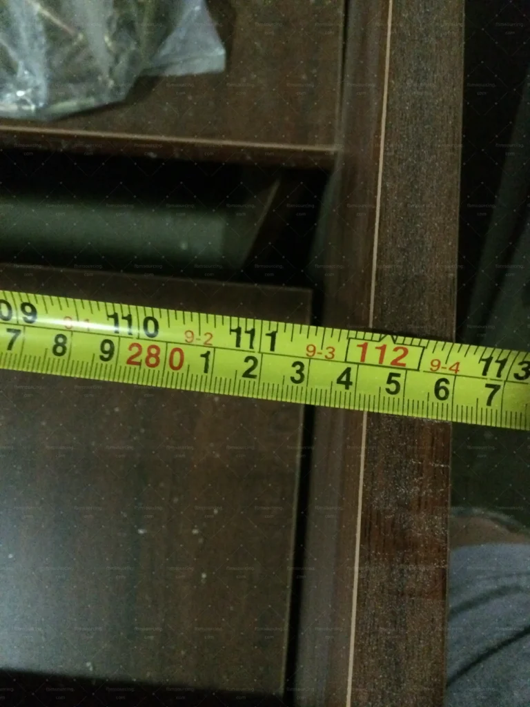 Cabinet interior shelving measured during furniture quality control