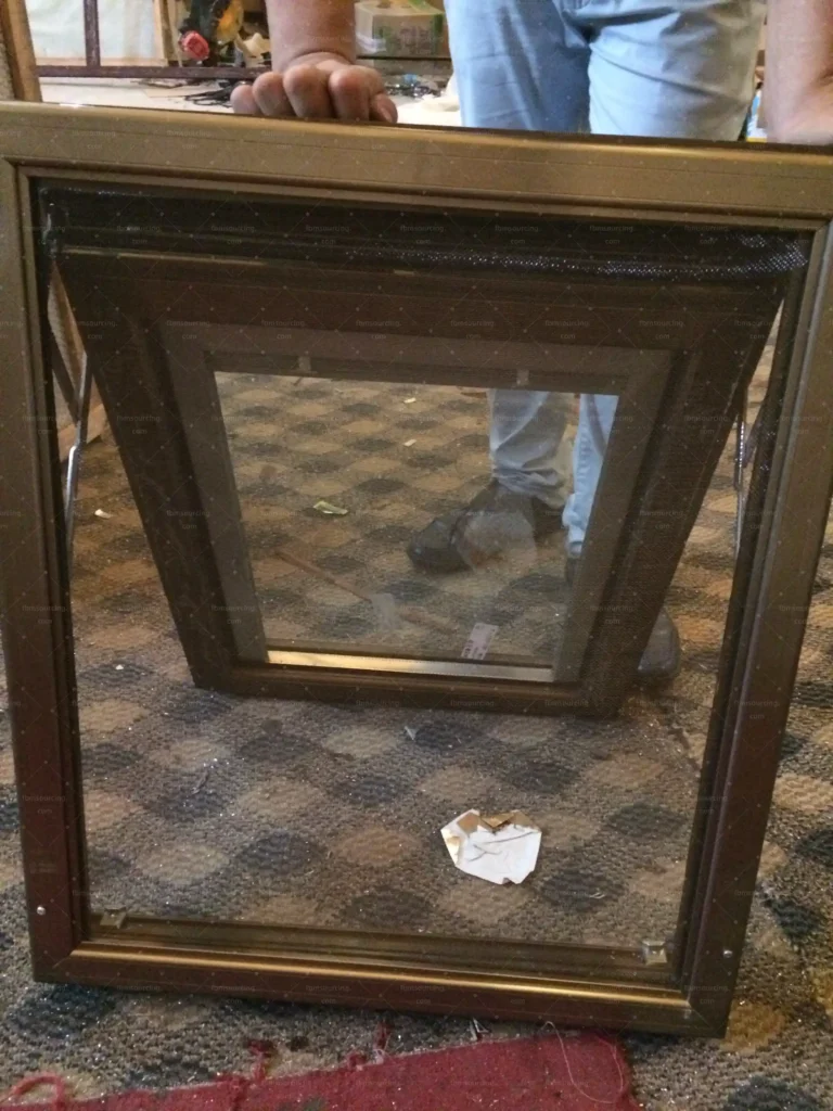 Aluminum window frame corner joint inspected during villa window QC
