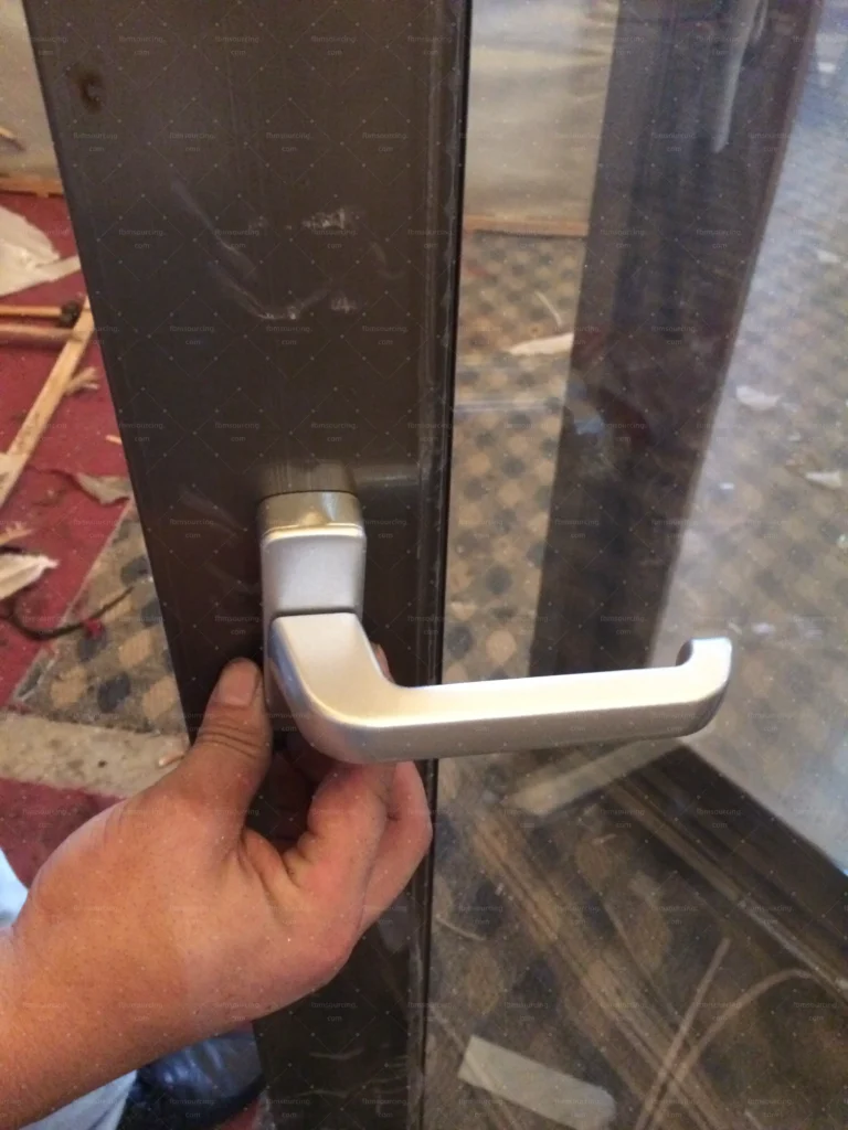 Interior door handle and lock operation tested during hardware inspection