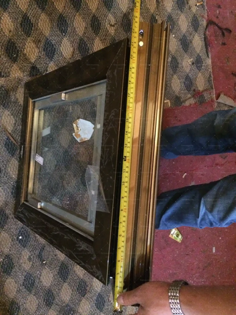 Framed bathroom mirror measured during final quality check