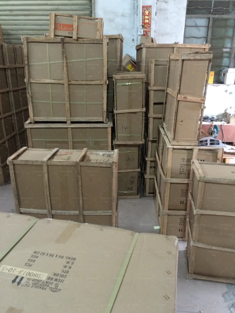 Crated furniture and materials staged in the warehouse after passing inspection