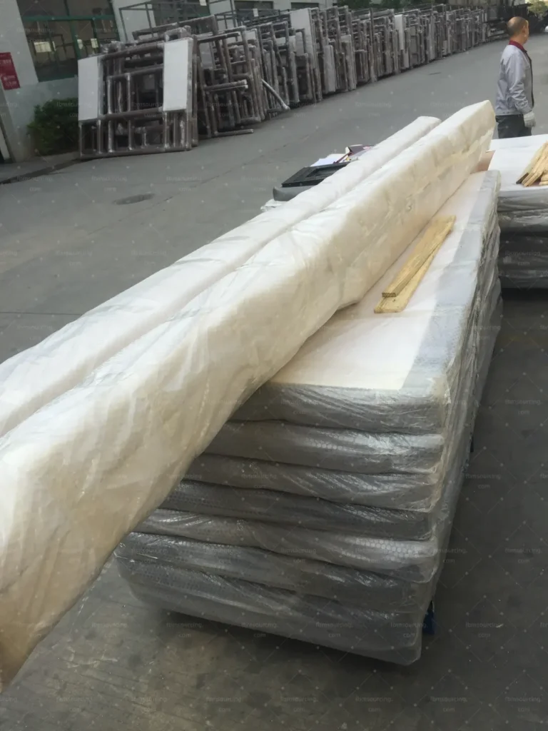 building material sourcing agent quality inspection - packed aluminum window units stacked for export - US contractor project
