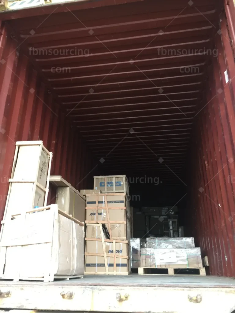 Wooden crates with kitchen cabinets and sanitary ware loaded in container