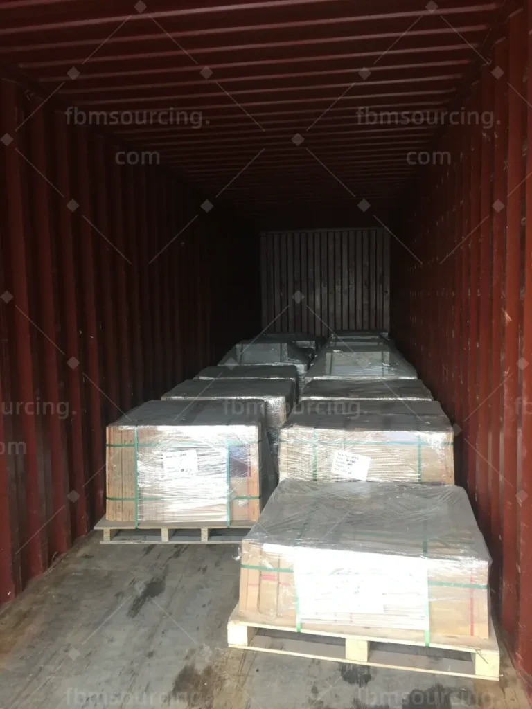 Pallets aligned and braced during villa order container loading