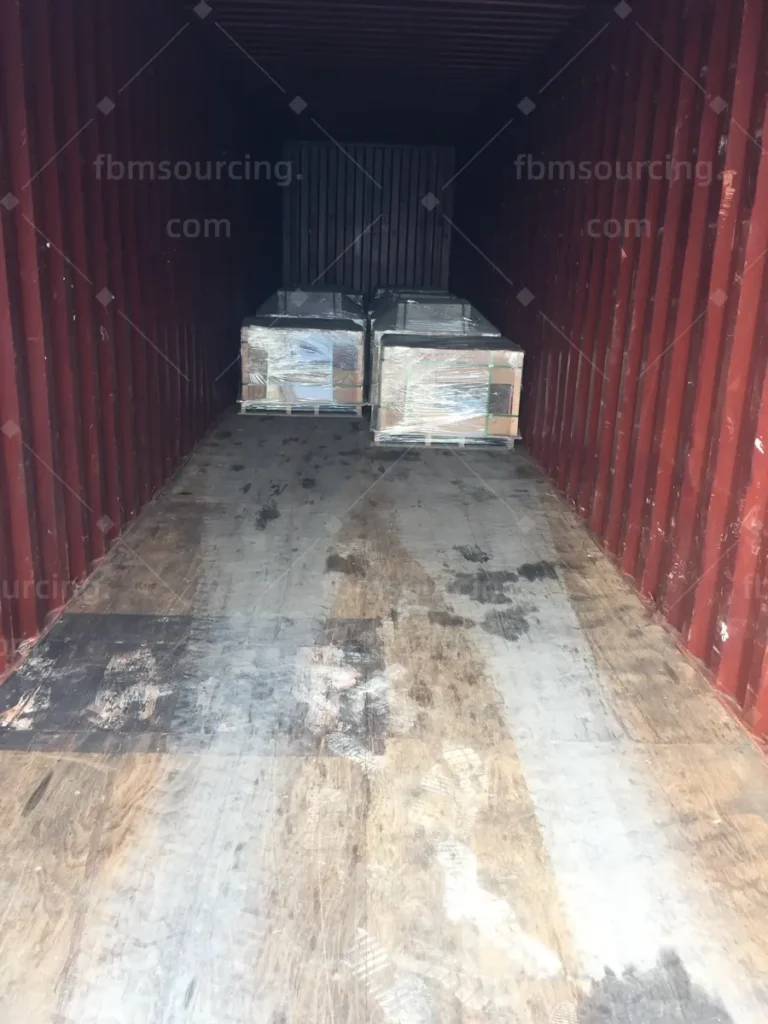 Tile pallets braced inside 40ft container for shipment to Australia