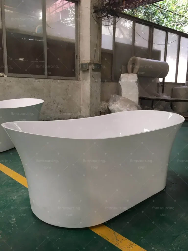 Freestanding bathtub profile and finish checked during sanitary ware QC