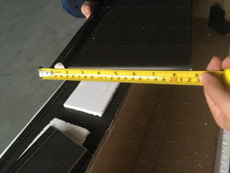 Cabinet door width measured during quality control for Australian villa order