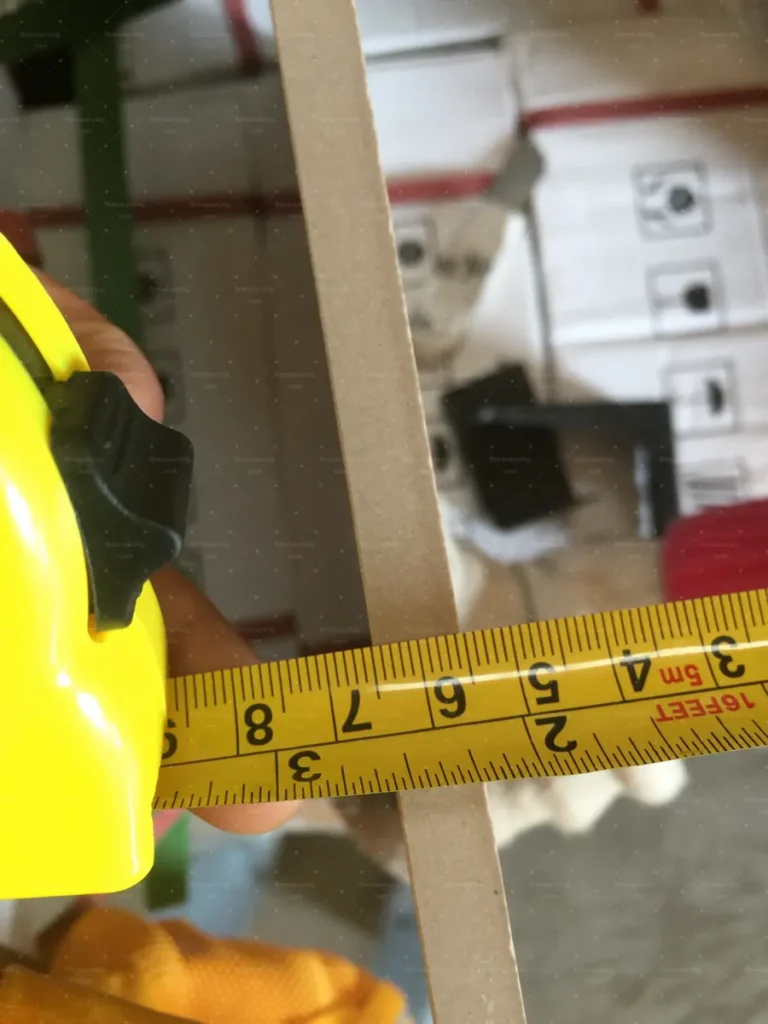 Tile edge and thickness gauge check during building materials inspection