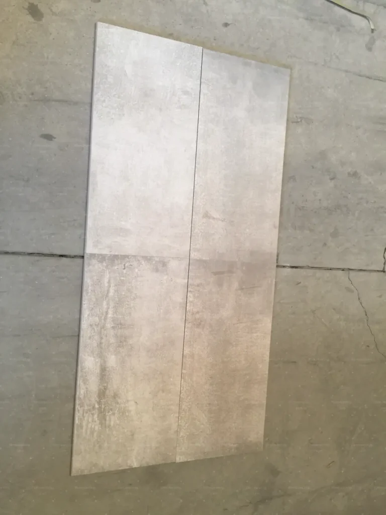 Tile pairs checked for calibre and flatness during villa tile QC