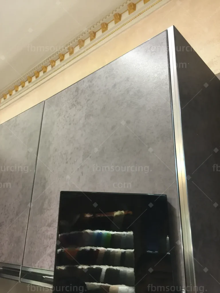 Dark laminate kitchen cabinet door sample reviewed during China furniture sourcing