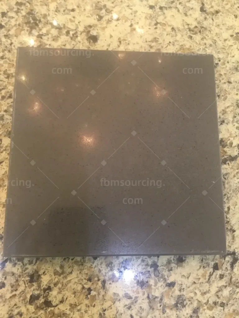 Dark grey porcelain tile sample for villa flooring sourced from China