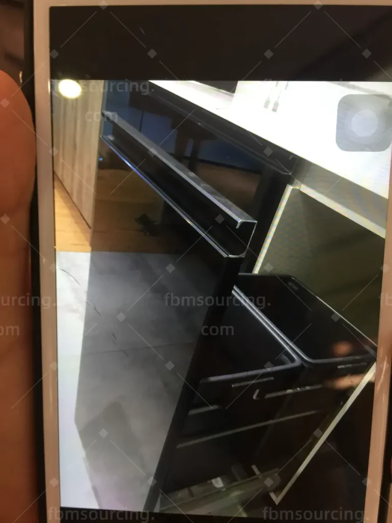 High-gloss cabinet unit inspected in Foshan cabinet factory showroom