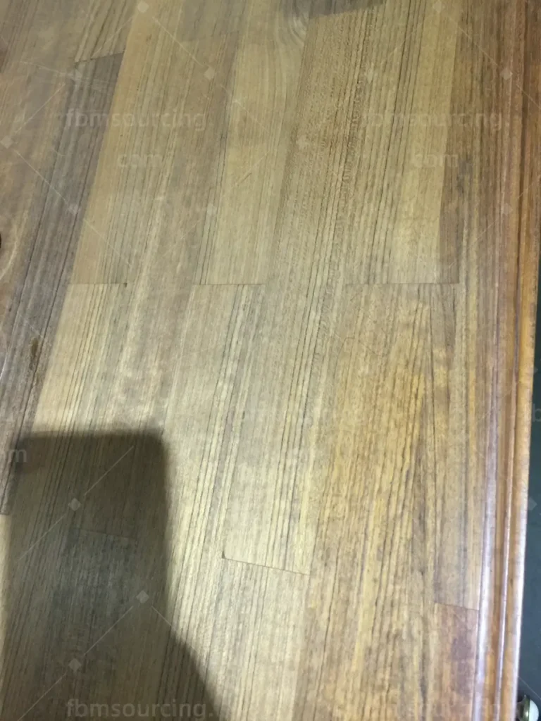 Solid timber benchtop finish checked during villa furniture procurement in China