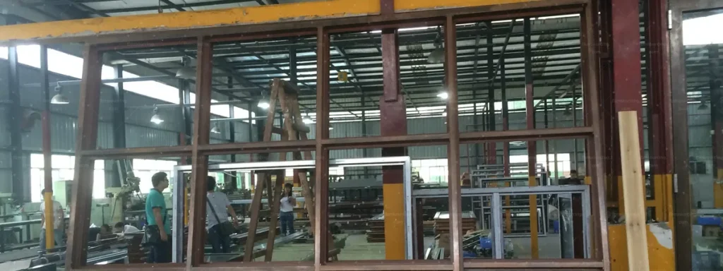 Custom timber-look aluminium windows and doors fabricated in China for an Australian villa project
