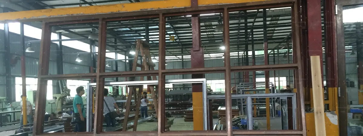 Custom timber-look aluminium windows and doors fabricated in China for an Australian villa project